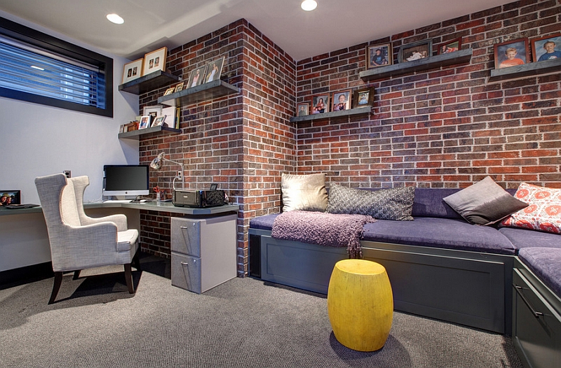 Contemporary-basement-home-office-with-a-brick-wall