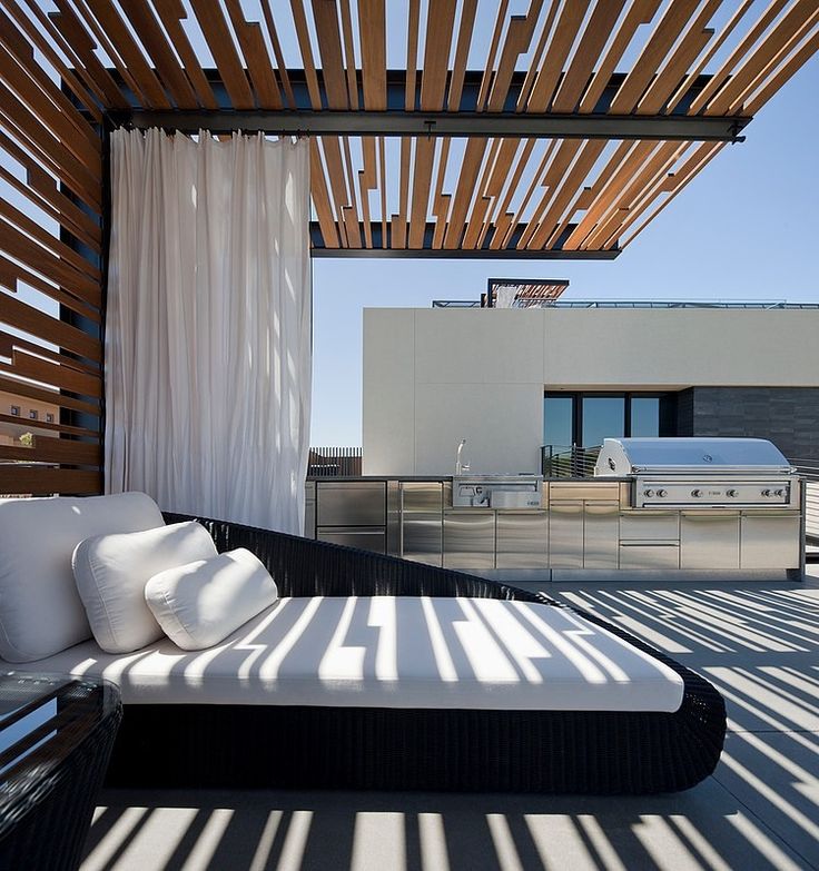 Contemporary-steel-and-timber-cantilevered-pergola