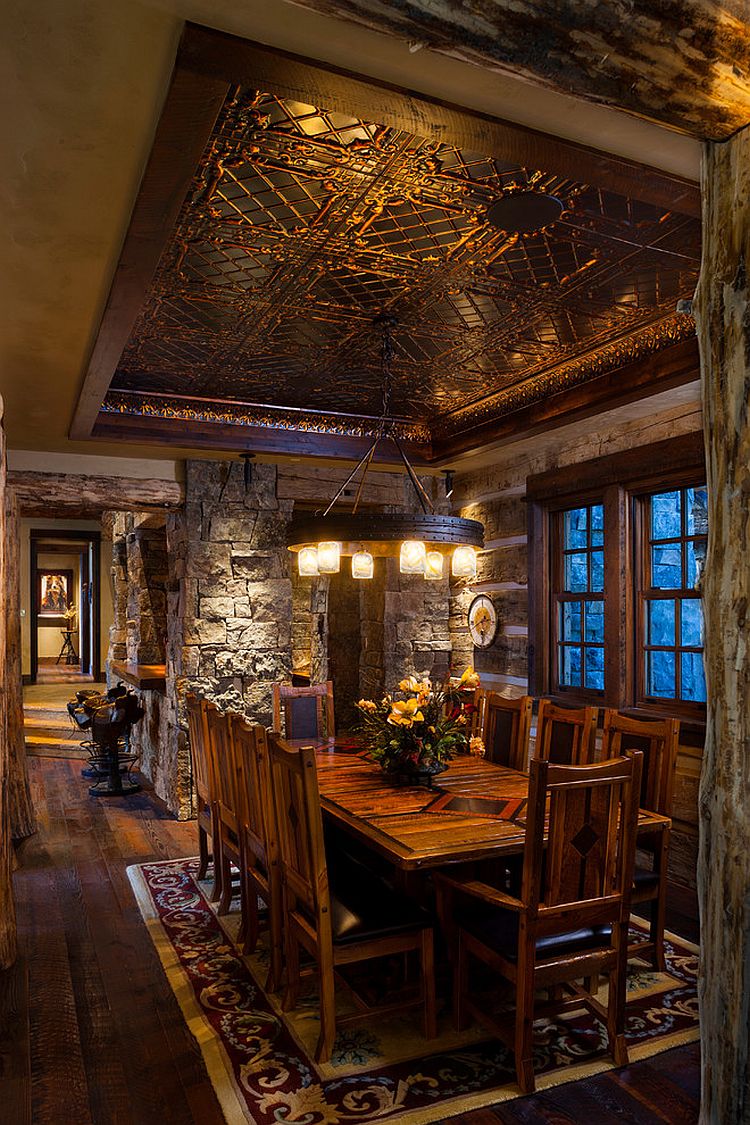 Log-cabin-dining-room-crafted-from-stone-and-reused-materials