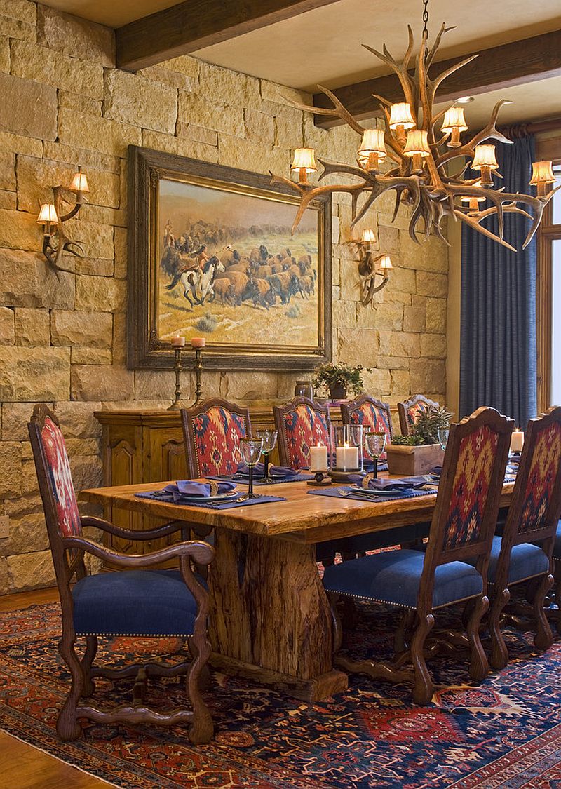 Stone-wall-and-antler-lighting-for-the-rustic-dining-room