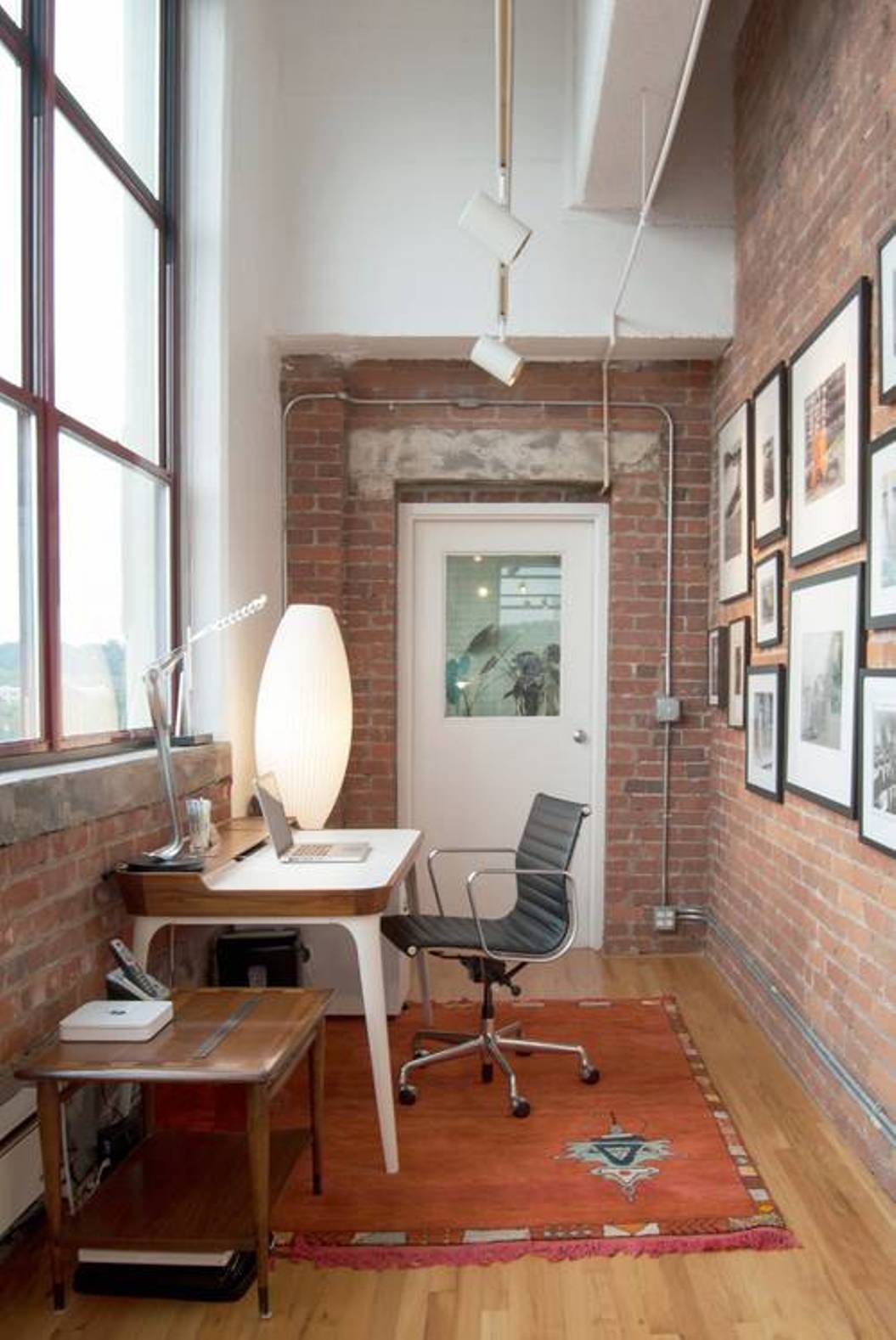 best-small-office-in-home-with-brick-walls-and-framed-wall-decor