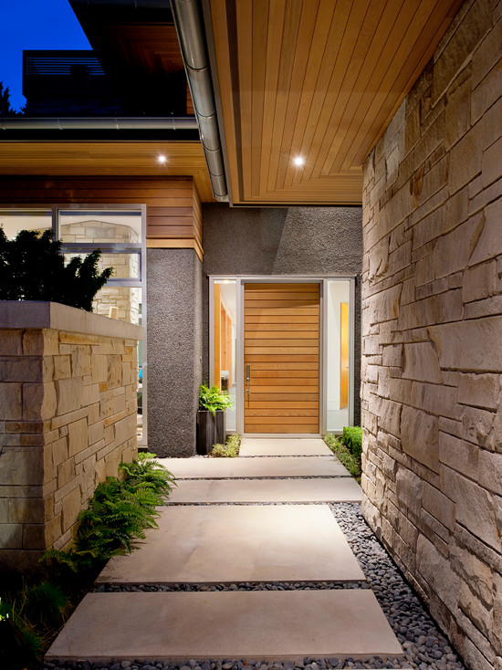 contemporary-entry-with-elegant-square-concrete-walkway-and-stones-for-entry-way