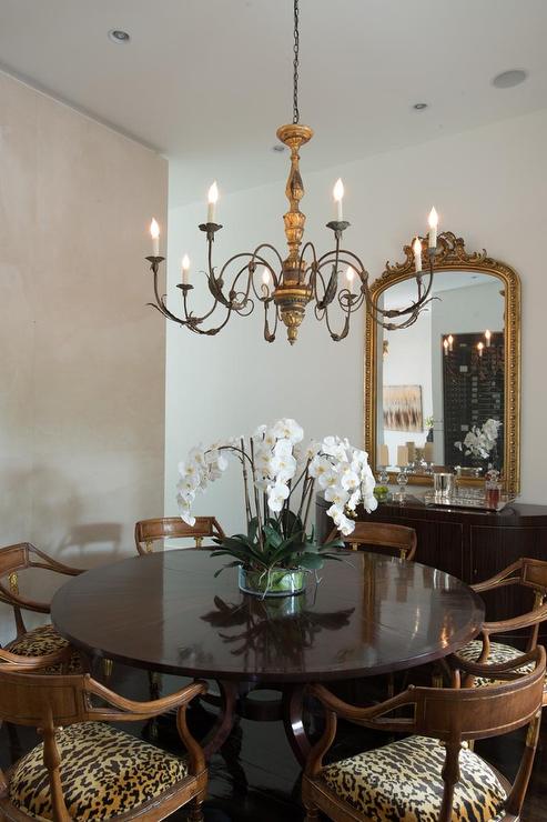 french-candle-chandelier-leopard-print-dining-chairs-curved-buffet-cabinet