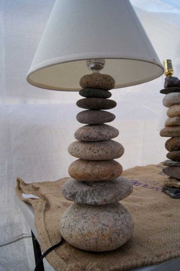 old-lamp-with-some-bigger-river-rocks