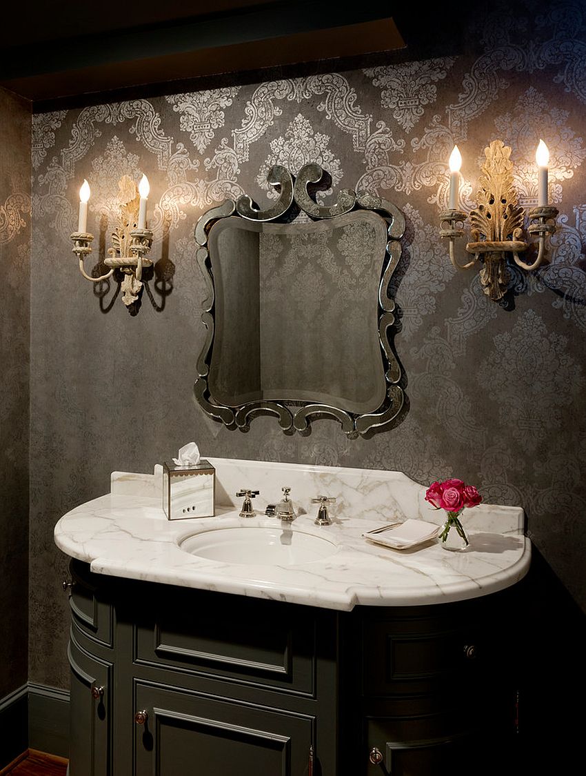 Sconce-lighting-and-wallpaper-bring-Victorian-style-to-this-powder-room