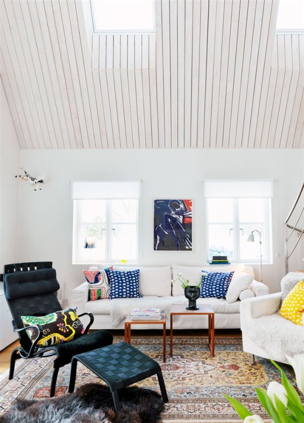 Scandinavian-Living-Room-with-Sloped-Ceiling