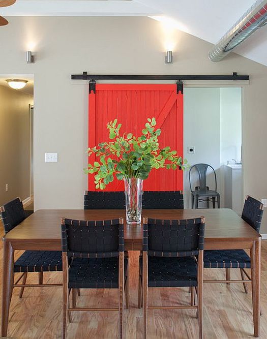 Sliding-door-brings-a-touch-of-bright-red-to-the-dining-room