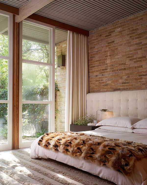 bedroom-with-brick-wall