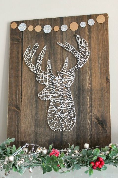 recycled-wooden-sign-with-a-banner-and-a-yarn-and-nail-deer